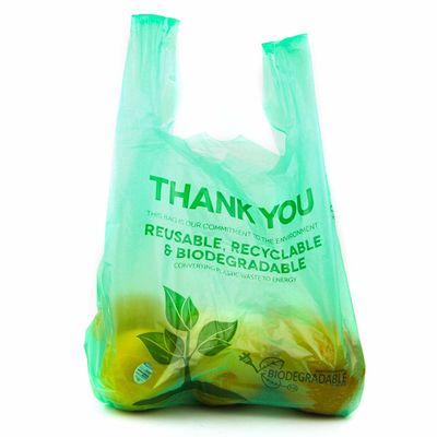 Bolsos vegetales biodegradables del 100%, las bolsas de plástico de encargo con las manijas