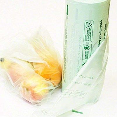 Bolsos plásticos en un rollo, bolsos vegetales durables de la producción del EN 13432 en el rollo 