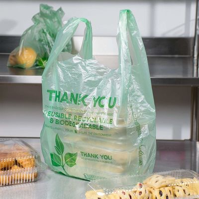 Los bolsos vegetales abonablees EN13432, camiseta abonable empaquetan servicio del OEM
